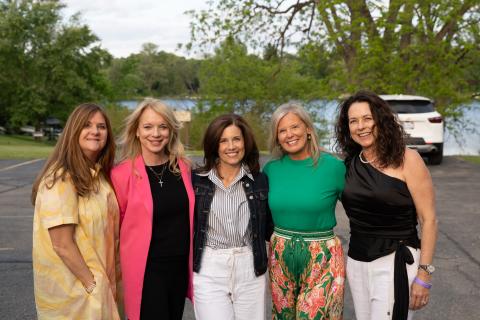 Group of 5 Home Tour guests posing for picture